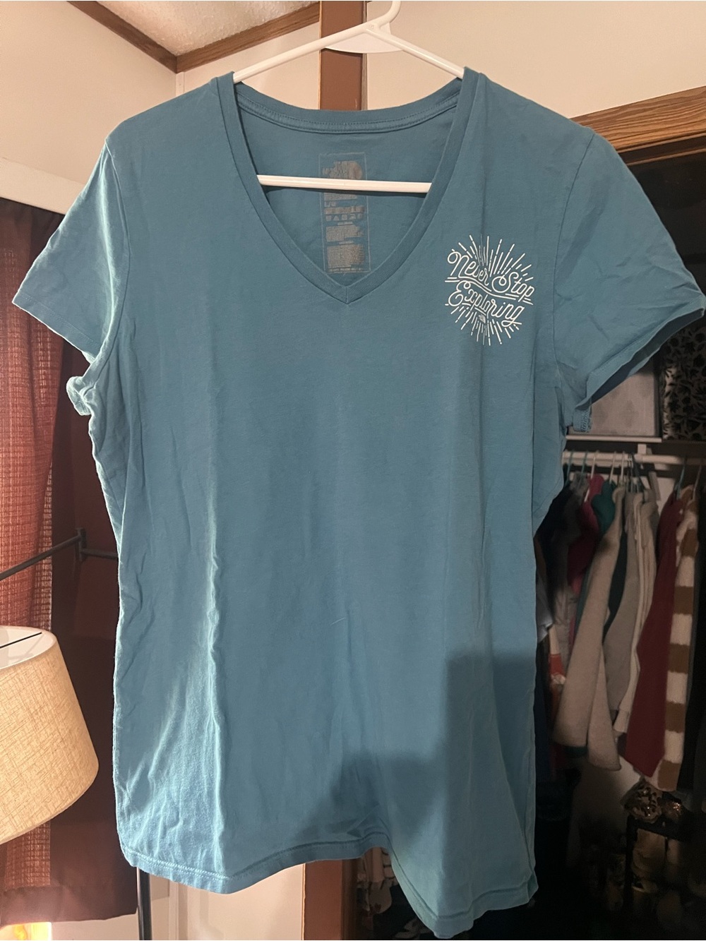 The North Face Teal V-Neck Short Sleeve Tee with White Chest Graphic